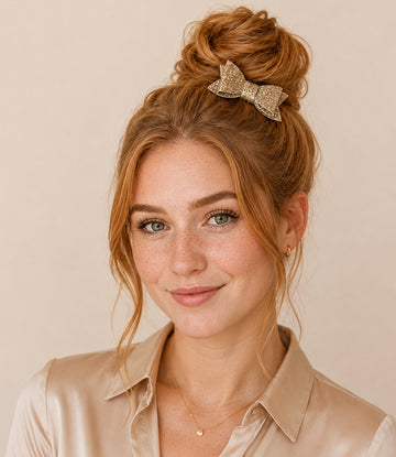 Haarstrikje met glitters in de kleur goud