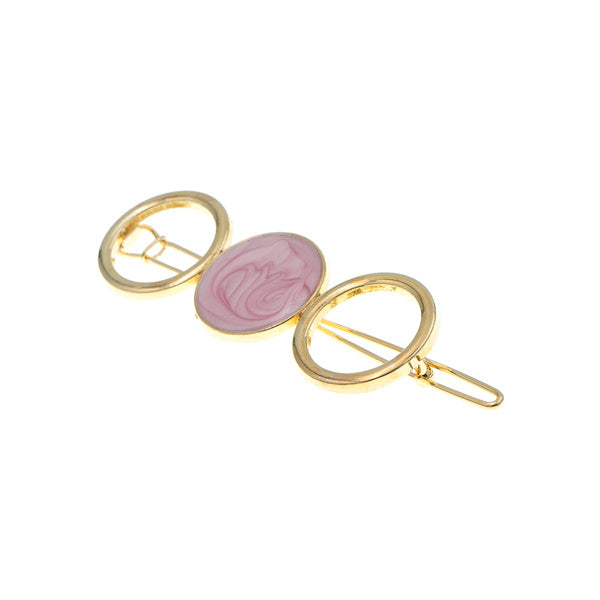 Haarclip goudkleurig cirkels roze