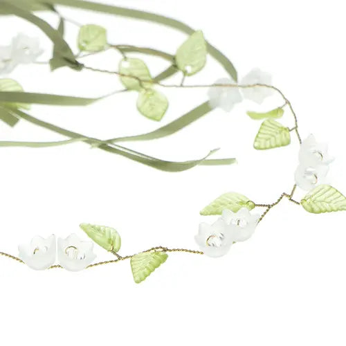 Haarketting met witte bloemen en lint
